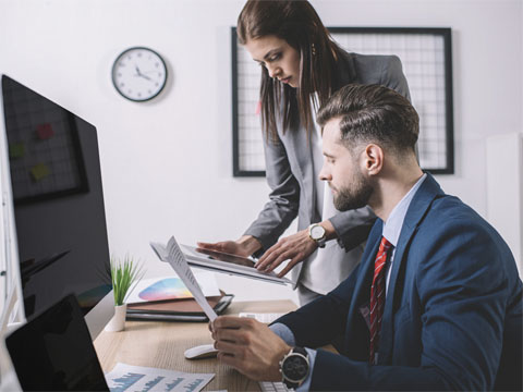 Two workers reviewing Managed IT Service in Atlanta